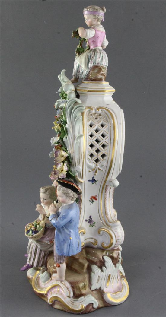 A Meissen porcelain mantel clock case, 19th century height 38cm, typical tiny losses
